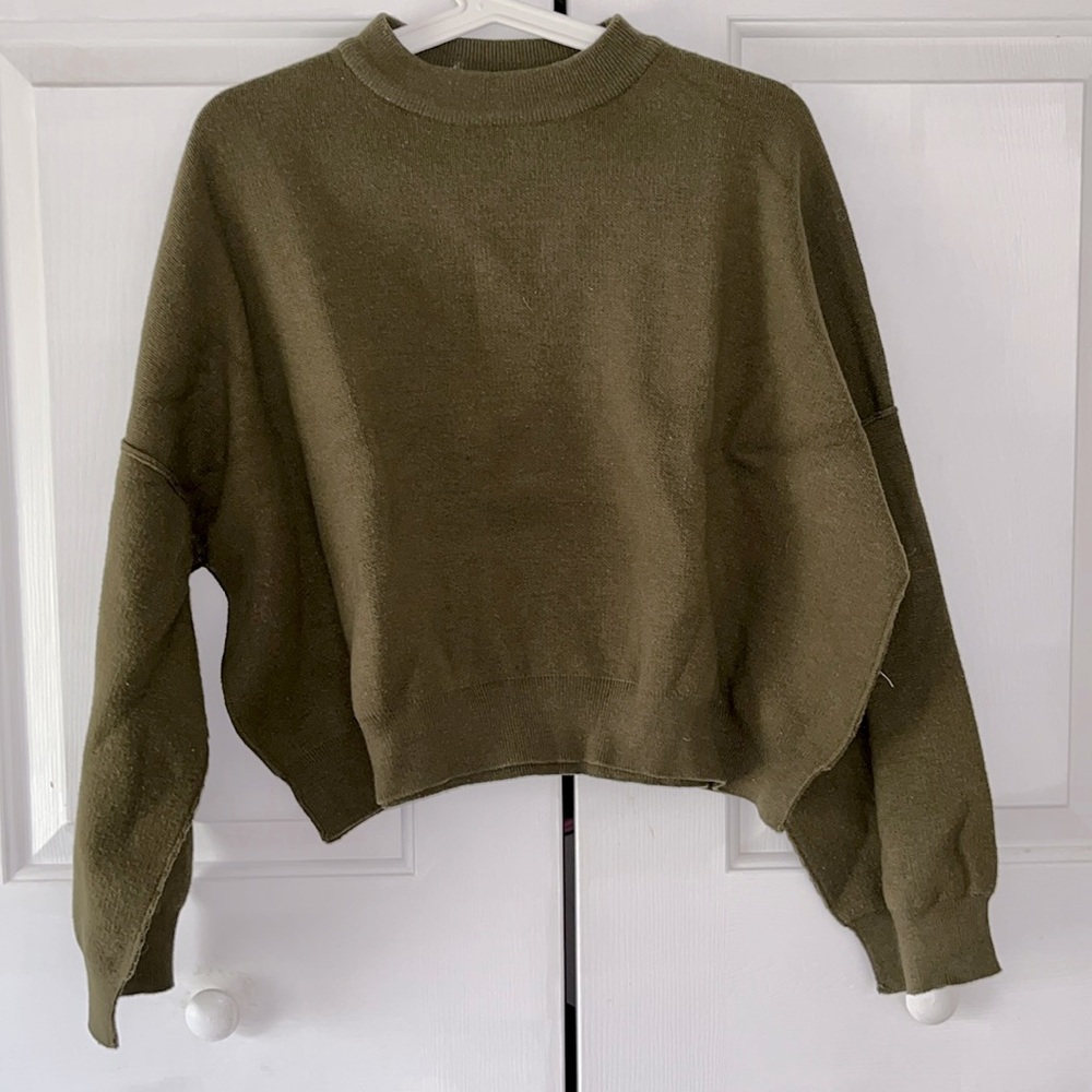 green sweater